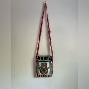 Rising International Hamsa Bohemian Flip Top Razor Cut Crossbody Bag
